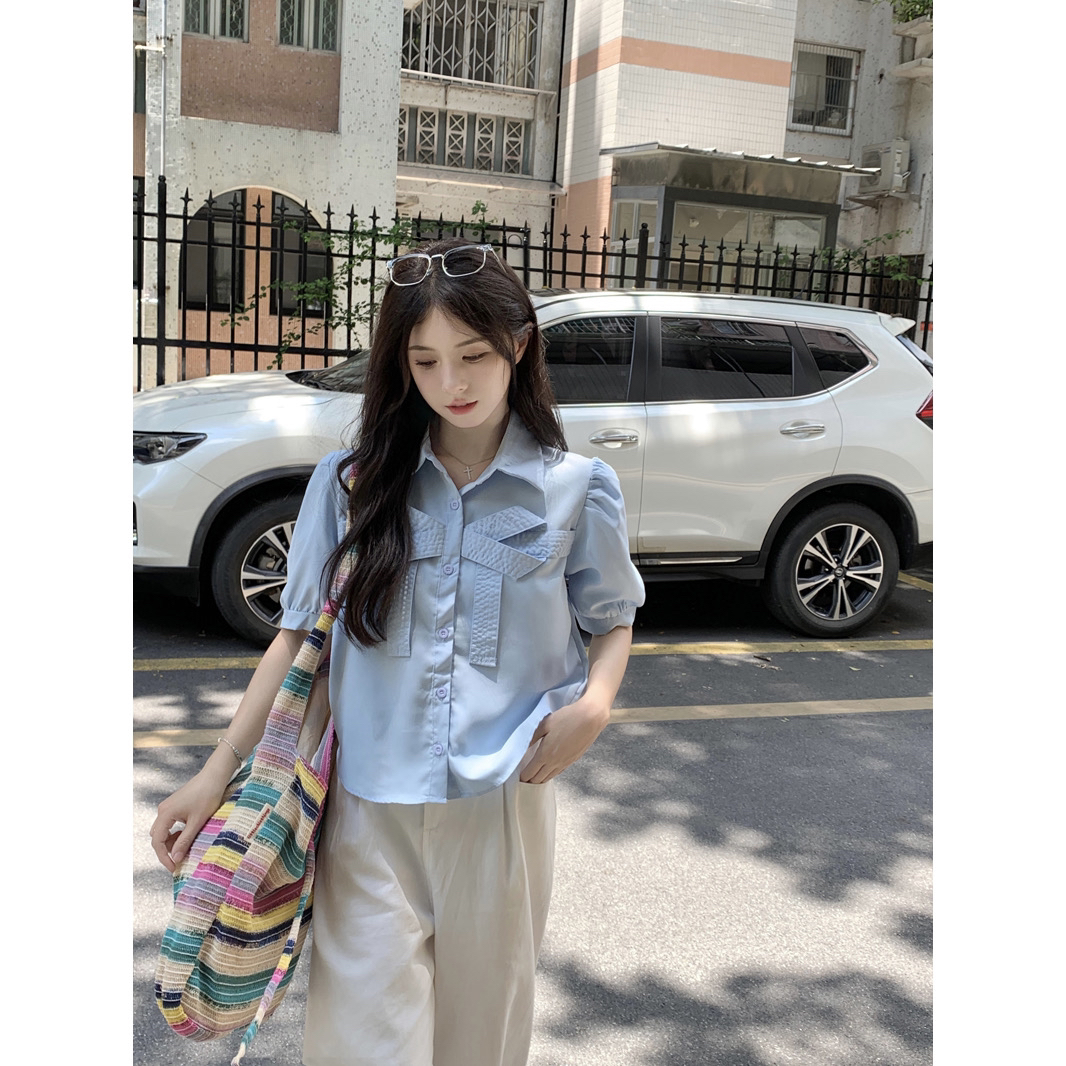 달콤함 나비 매듭 쇼트 스타일 맨위 여성 2026 여름 새로운 프랑스식 Chic 부드러운 POLO 칼라 거품 소매 맨위