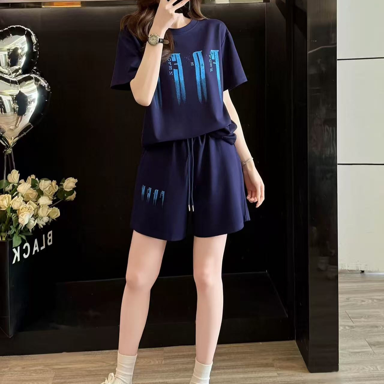 유럽 상품 캐주얼 스포츠 슈트 여성 2026 새로운 여름 패션 외국 가스 알파벳 프린트 반팔 반바지 투피스 세트