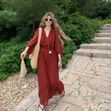 批发微胖气质显白红色旅游度假风长袖v领系带上衣松紧腰半身裙套装秋