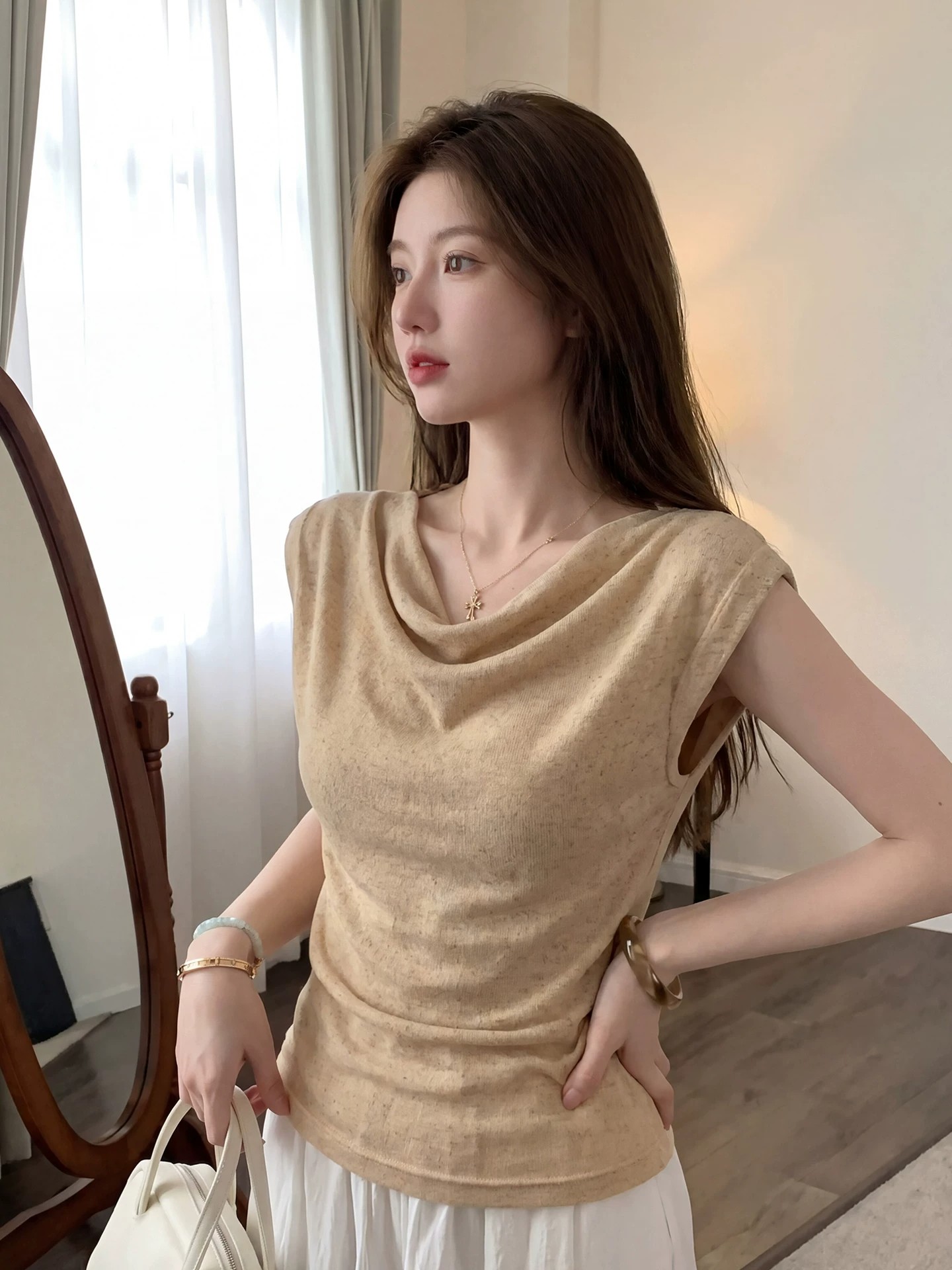 한 부서 작은 대중 고유 한 흔들다 칼라 홀로우 아웃 니트 티셔츠 여성 2026 여름 새로운 캐주얼 느긋한 민소매 ins 맨위