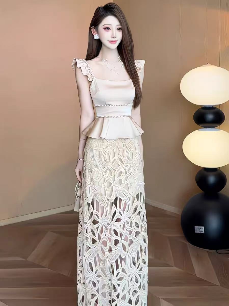 빛 럭셔리 고급 센스 Feifei 소매 조끼 물결무늬 밑단 디자인 맨위 홀로우 아웃 꽃 롱 스커트 패션 세트 여성 여름