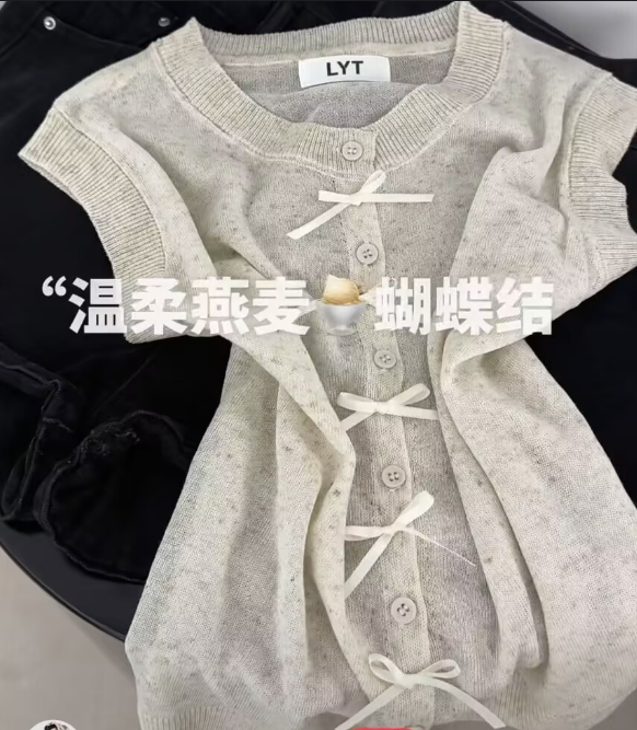 부드러운 오트밀 색상 나비 매듭 니트 반팔 여성 여름 새로운 얇은 스타일 통기성 연령 감소 다용도 슬림해 보이는 오픈 가디건 맨위