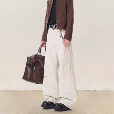 批发2026春<b class='q'>秋</b>新款原牛纽扣宽松解构弯刀牛仔裤男女美式复古阔腿休闲裤