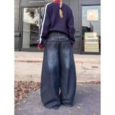 批发美式复古弯刀牛仔裤男女设计感立体阔腿老爹裤松弛感拖地镰刀<b class='q'>长裤</b>