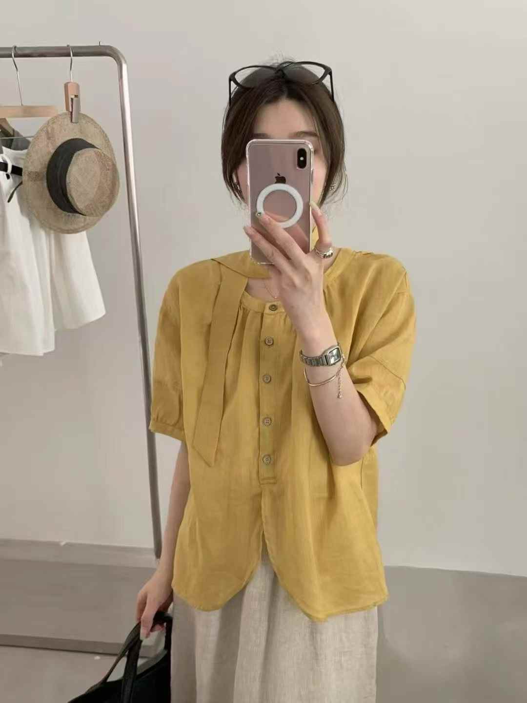 한 부서 미니멀리즘 레이스 패치워크 여성 셔츠 여름 2026 새로운 거품 소매 주름 장식 디자인 센스 라운드 넥 맨위 트렌디