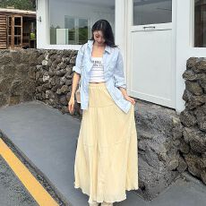 批发温柔风设计感压褶半身裙杏色A字裙女夏季高腰百搭大摆裙长裙子