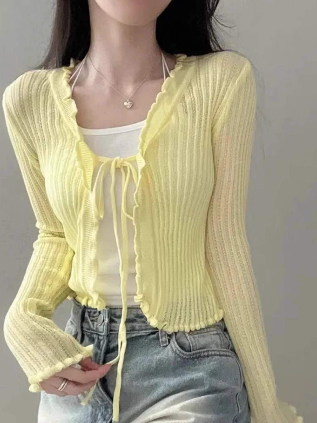 황색 긴팔 니트 오픈 가디건 여성 이른 봄 2026 년 새로운 얇은 스타일 스웨터 자외선 차단 재킷 몸매 가꾸기 맨위 외부 가져 가라.