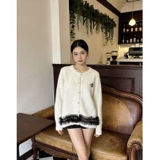 批发网纱下摆拼接针织开衫女2025冬季新款可拆卸花朵法式毛衣显瘦外套