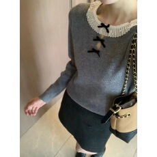 批发秋冬款圆领长袖蝴蝶结领口镂空针织羊毛衫女显瘦2025