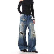 批发破坏补丁做旧水洗牛仔女小众设计感宽松休闲百搭破洞长裤子