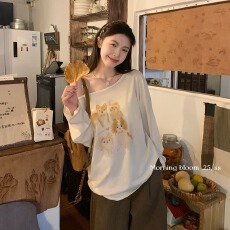 批发原版面料 卡通印花斜肩长袖T恤女秋季新款宽松休闲上衣潮