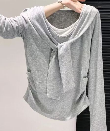 눈꽃 면 165 그램 페이크 레이어드 긴팔 티셔츠 여성 이른 봄 외출용 2026 새로운 패션 몸매 가꾸기 디자인 고급