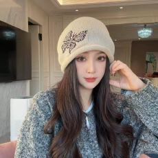 批发蝴蝶卷边堆堆帽女2025新款护耳保暖帽显脸小百搭包头帽针织冷帽冬