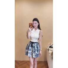 批发新款气质淑女修身翻领无袖针织上衣+高腰系带印花半身裙套装