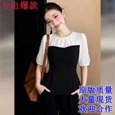 批发<b class='q'>通勤</b>风黑白撞色泡泡袖圆领上衣女2026春季新款收腰拼接设计感短袖