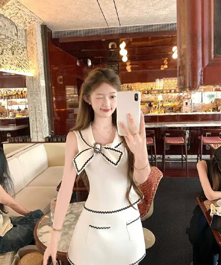 작은 샤넬 스타일 나비 매듭 민소매 맨위 한 마디 반신 스커트 투피스 슈트