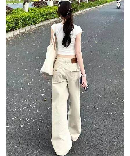 아메리칸 얕은 살구 색상 넓은 다리 청바지 여성 2026 봄 새로운 로우 웨이스트 루즈핏 슬림해 보이는 도루 센스 바닥 청소 스트레이트 팬츠