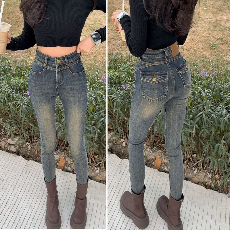 水泥灰提臀小脚牛仔裤女秋季新款...