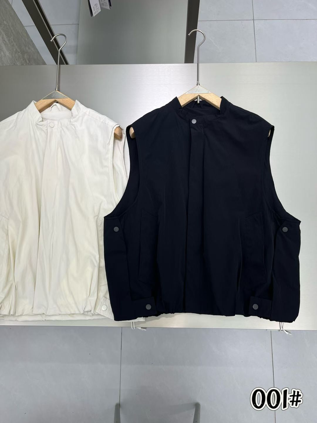 봄 여름 새로운 지퍼 스탠드 칼라 쇼트 스타일 워크웨어 베스트 남자 여자 스택 착용 민소매 어깨 조끼 조수 브랜드 재킷