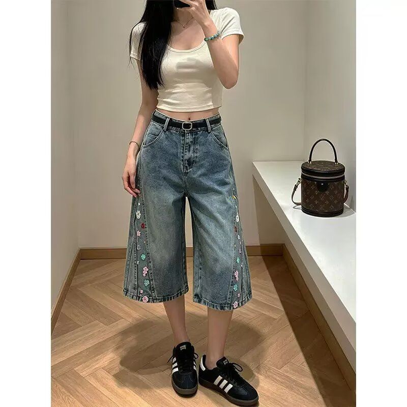 넓은 다리 7 점 청바지 2026 여름 새로운 인기 디자인 센스 스트레이트 바지 남자 거리 루즈핏 반바지