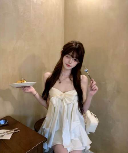 프랑스식 달콤함 미니 스커트 여름 품격 슬림해 보이는 디자인 센스 나비 매듭 새틴 프릴 행침