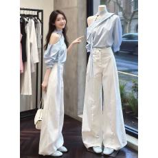 批发法式蓝色斜肩衬衫女2026新款春装衬衣设计感小众通勤穿搭露肩上衣