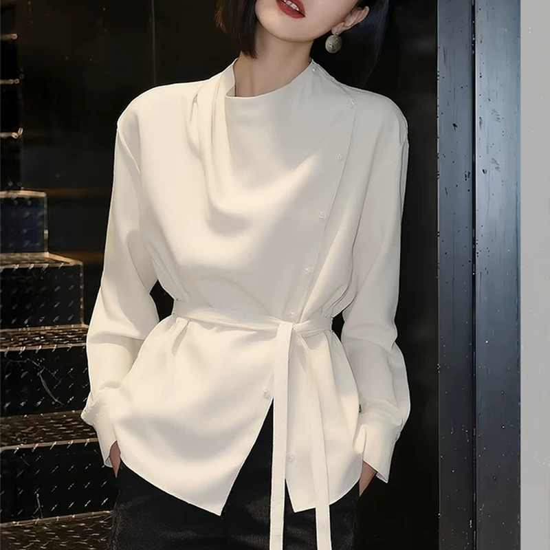 아름다운 다용도 허리 수축 베이지 색 여성 셔츠 봄 2026 년 새로운 외국 가스 연령 감소 작은 셔츠 고급 센스 셔츠
