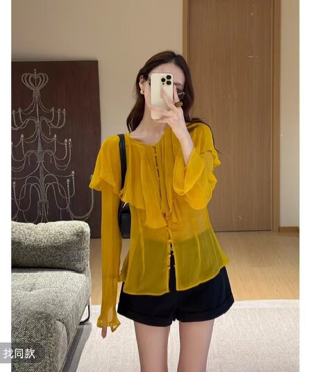 디자인 센스 불규칙 단추 프랑스식 부드러운 바람 나팔 소매 긴팔 셔츠