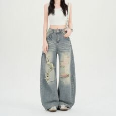 批发实拍实价~街头<b class='q'>水洗</b>猫须纹破洞牛仔裤女夏季新款复古弯刀阔腿长裤