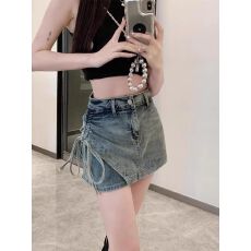 批发辣妹设计感牛仔<b class='q'>半身裙</b>夏季新款侧边抽绳a字短裙<b class='q'>不规则</b>包臀裙裤潮