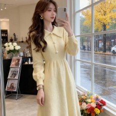 批发温柔风黄色针织连衣裙女2025秋冬新款收腰显瘦高级感洋气法式长裙