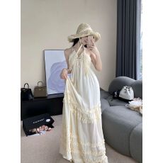 批发少女纯欲度假风性感挂脖吊带<b class='q'>连衣裙</b>女木耳边露背绑带海边拍照长裙
