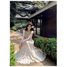 批发海边纯欲度假风性感挂脖吊带<b class='q'>连衣裙</b>女木耳边法式露背绑带蛋糕长裙