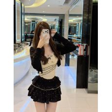 纯欲甜辣妹蝴蝶结吊带上衣女高级感显瘦蛋糕短裙套装