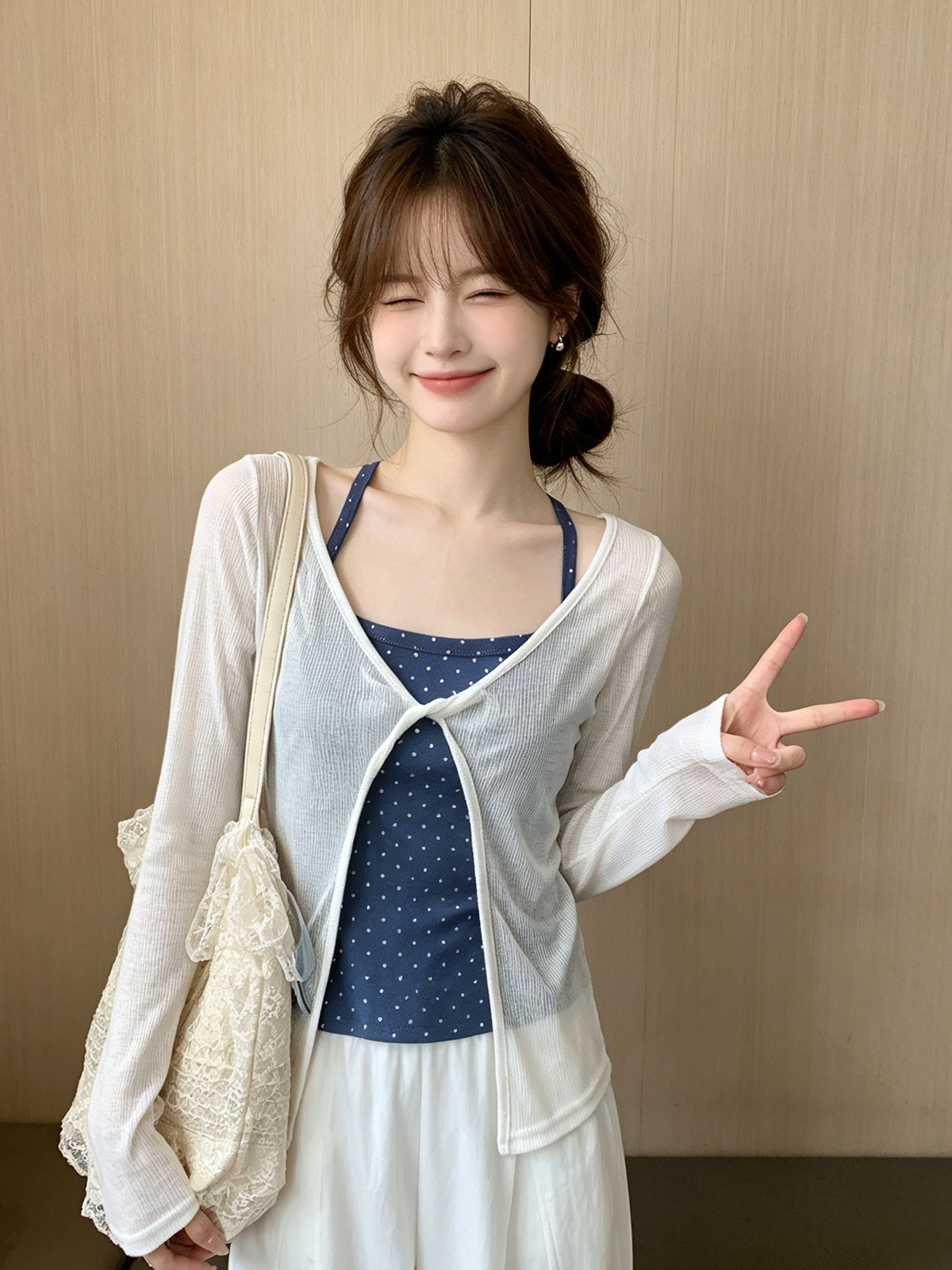 简约少女风设计感蝴蝶结针织吊带女夏季新款宽松百搭长袖防晒罩衫 服裝批發女裝批發服飾貨源