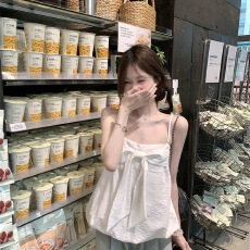 批发甜美风设计感蝴蝶结<b class='q'>吊带</b><b class='q'>背心</b>女夏季花苞下摆显瘦白色上衣