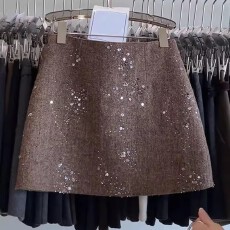 批发2025冬季亮片毛呢半身<b class='q'>裙</b>短款A字<b class='q'>裙</b>修身短<b class='q'>裙</b>设计感订珠<b class='q'>直筒</b>包臀