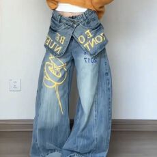 批发拼接凡乐鼠叠穿<b class='q'>裙裤</b><b class='q'>女</b>春辣妹假两件字母印花拖地牛仔弯刀裤