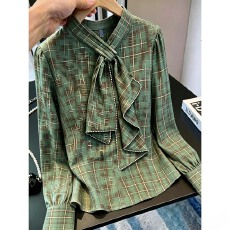 批发韩版时尚蓝色翻领单排扣<b class='q'>衬衫</b>长袖女2026年春季绑带收腰高级感上衣