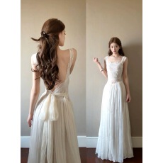 批发白色<b class='q'>蕾丝</b>拼接网纱吊带<b class='q'>连衣裙</b>女夏季度假风性感纯欲礼服露背长裙子