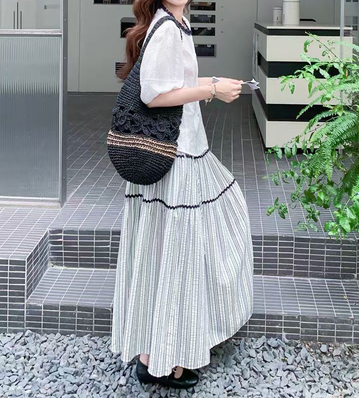 프랑스식 품격 여름 ootd 착용 가져 가라. 여성 2026 새로운 큰 진자 루즈핏 패치워크 스트라이프 반신 스커트 여성