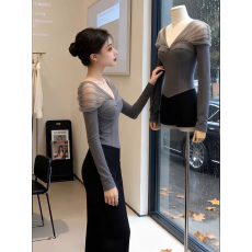 批发独特别致网纱拼接一字领T恤女长袖秋冬设计感鱼骨掐腰带胸垫<b class='q'>上衣</b>