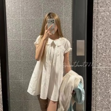 批发法式白色娃娃领短袖<b class='q'>连衣裙</b>女<b class='q'>夏</b>季2026新款巨好看特别漂亮显瘦短裙