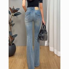 批发性感丰胯裤<b class='q'>韩版</b>显身材简约翘臀设计感口袋显腿长微喇<b class='q'>牛仔裤</b>女士