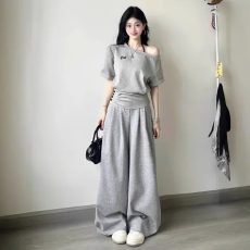 批发高级感休闲<b class='q'>运动</b>服套装<b class='q'>女</b>夏季收腰显瘦露斜肩短袖上衣阔腿裤<b class='q'>两件</b>套