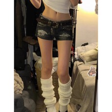 批发辣妹低腰破洞牛仔短裤女夏季2026年新款设计感紧身显瘦包臀热裤子