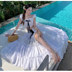 批发2025新款越南小众度假风荷叶边一字肩绑带吊带开衩半身裙套装