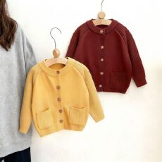 批发【实拍图】女宝宝南瓜色毛衣针织衫<b class='q'>儿童</b><b class='q'>外套</b>开衫时髦口袋上衣