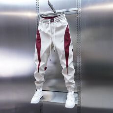 批发春秋款潮牌小脚九分裤新款男款裤子拼接男裤红色休闲裤束脚哈伦裤