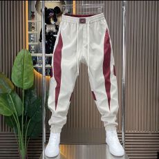 批发男士拼接束脚休闲裤2026夏季潮流百搭松紧腰弹力小脚裤撞色哈伦裤